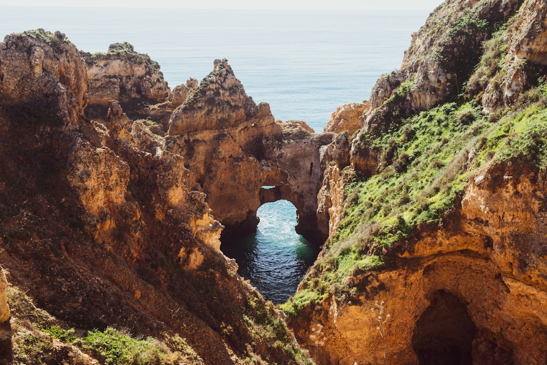 Steep cliffs by the sea – a broad view with many details in a rough landscape